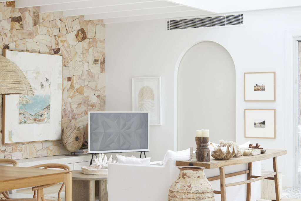 The home is infused with a delightfully unpretentious and relaxed vibe. Pictured: Samsung Serif TV. Photo: Nicky Ryan