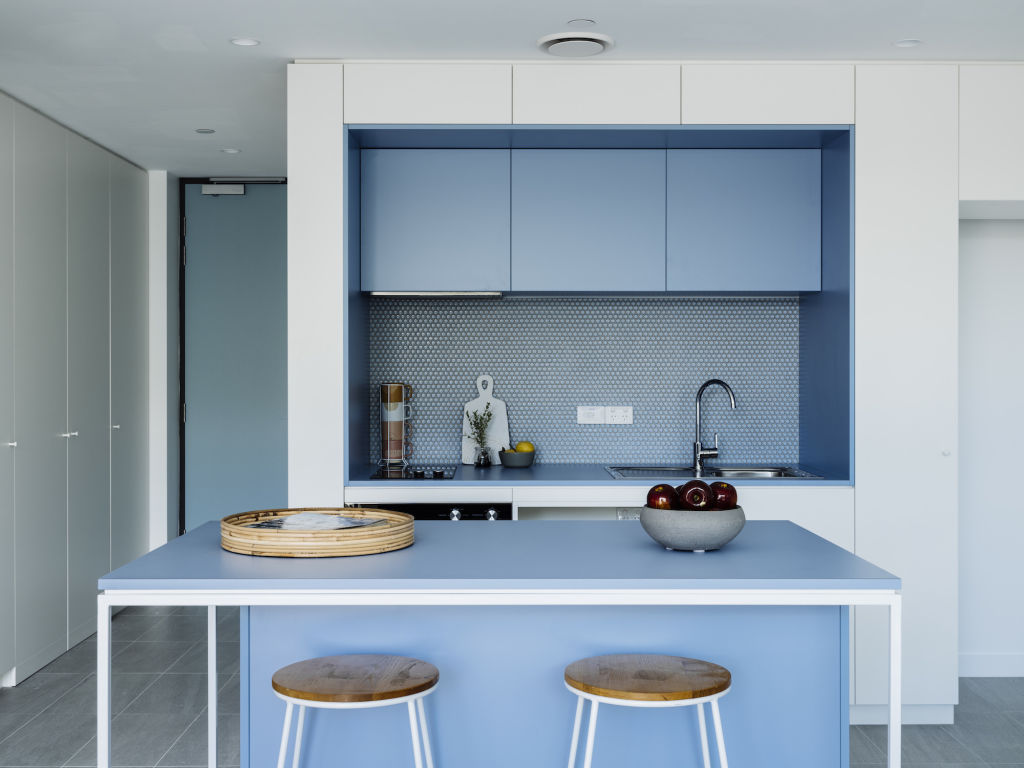 Georgia Neale of Melbourne’s M.J. Harris Group advises choosing kitchen colours based on those you’re drawn to in your wardrobe. Kitchen by Cumulus Studio. Photo: Adam Gibson