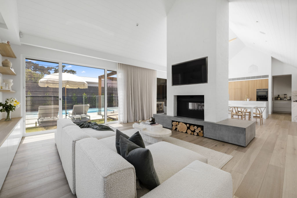 The expansive open-plan living area overlooking the pool. Photo: Whitefox