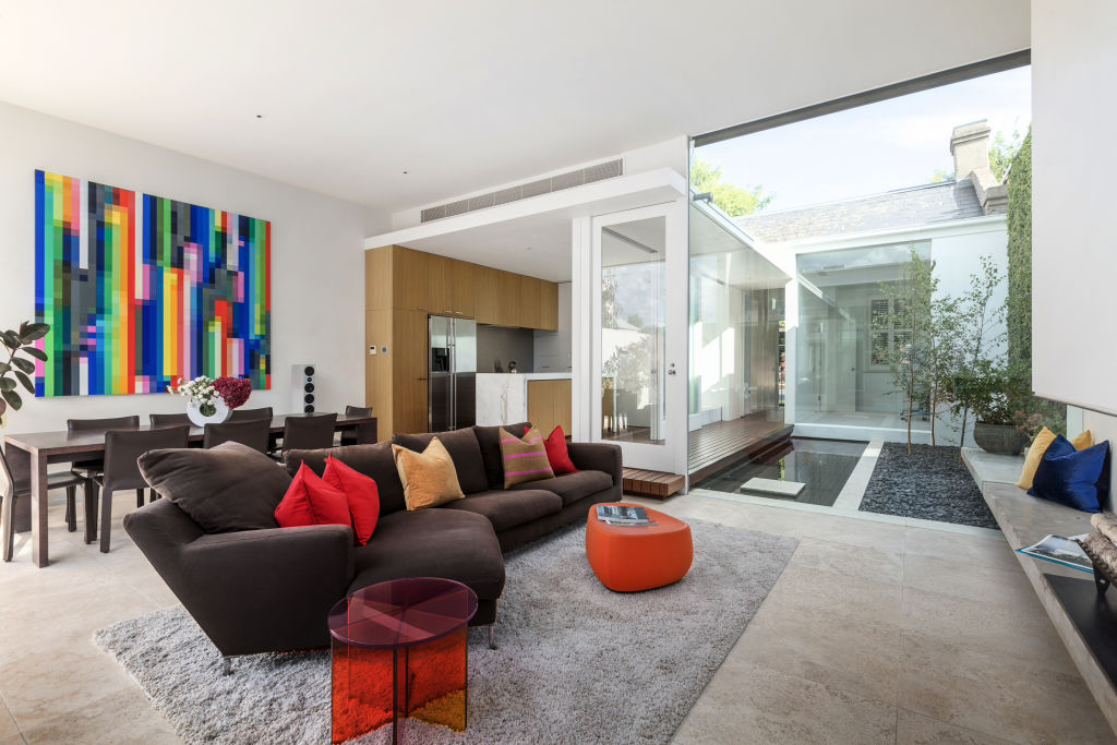 The floor to ceiling glass walls transform the space. Photo: Jellis Craig