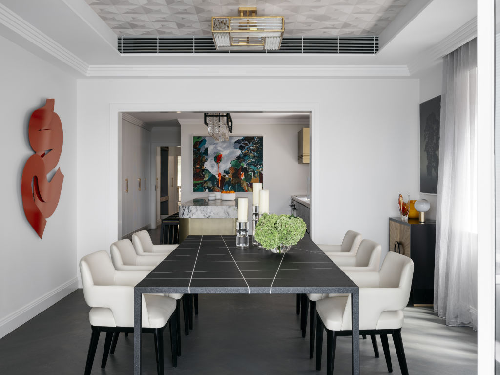 The dining room features a bold abstract work by Korban Flaubert. Photo: Felix Forest Interiors: Brendan Wong Design