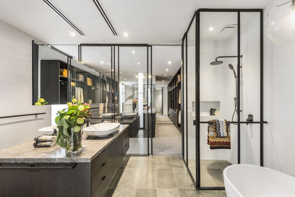 The bathroom in 1A Selwyn Court in Toorak connects to an oversized walk-in dressing room. Photo: Supplied