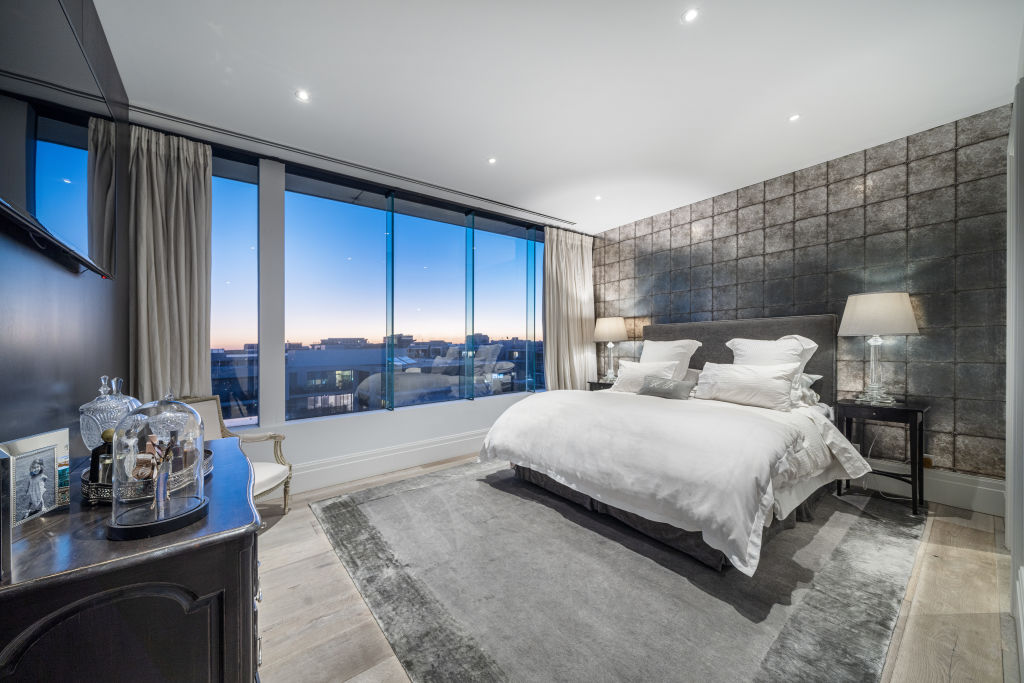 The ample main bedroom, one of five available at the penthouse. Photo: Kay &amp; Burton