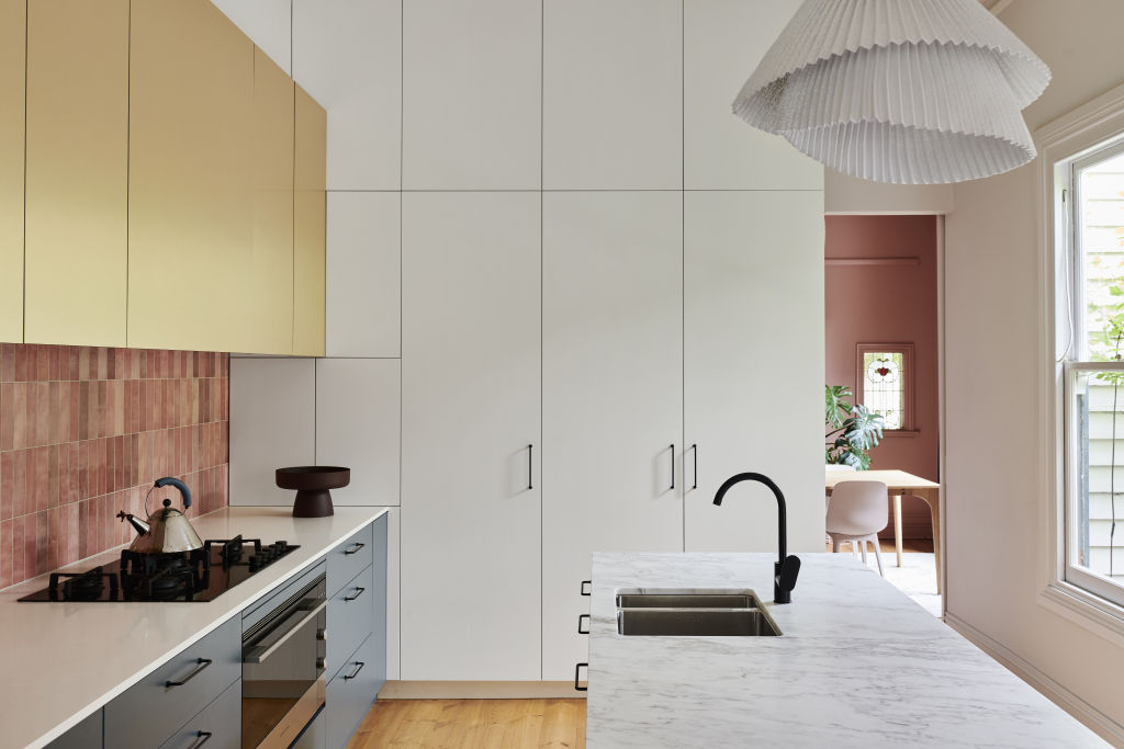 Tempo Vivace Pendant Light by Arturo Álvarez.  Door handles by Linear Standard. Tapware by E&S. Marble from Signorino. Laminex Brushed Titanium on overhead cupboards. Styling: Annie Portelli Photo: Eve Wilson