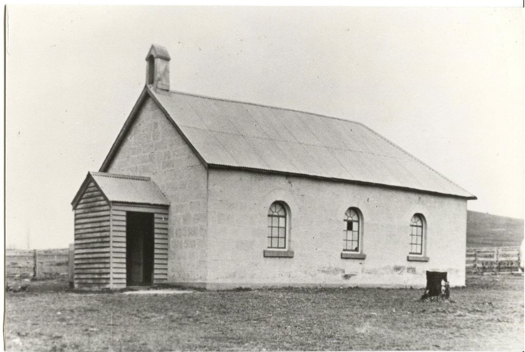 The original 1800s Redbank Church with its solid sandstone walls and belltower. Photo: Supplied