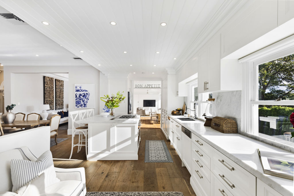 The family-sized kitchen boasts an array of bespoke finishes. Photo: Supplied
