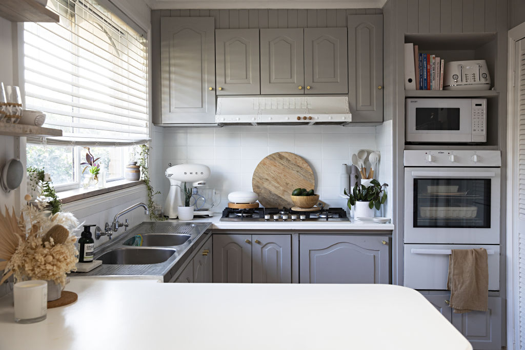 The biggest makeover has been in the kitchen, which has gone from dark and dingy to light and bright. Photo: Natalie Jeffcott