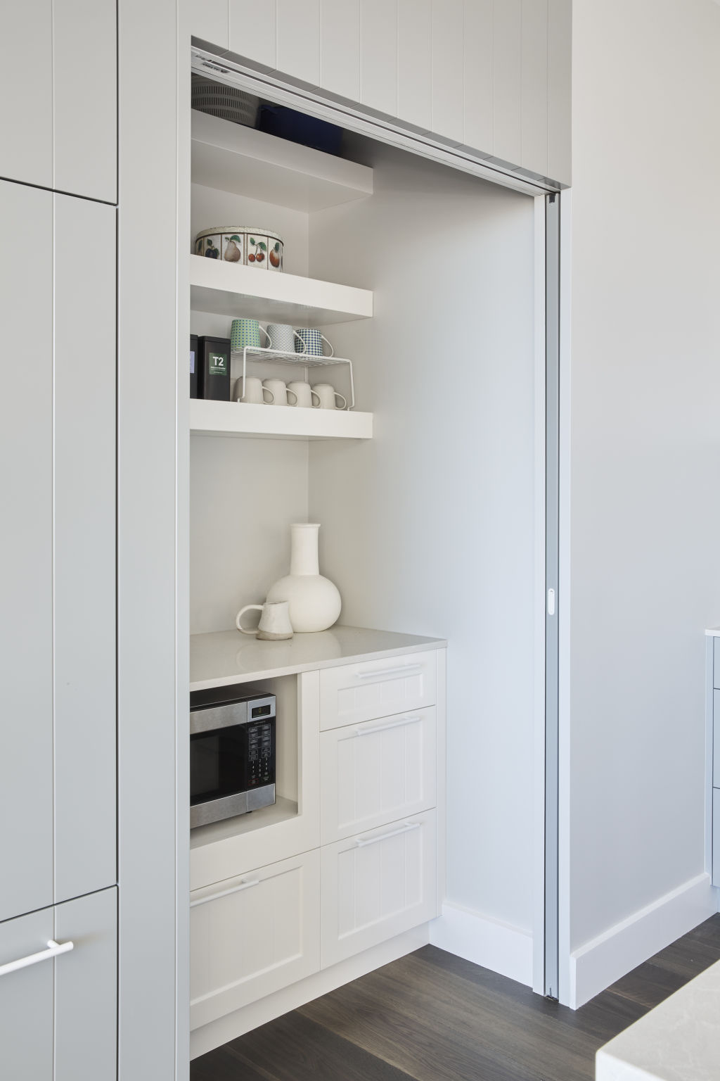 Storage is key when it comes to creating more space in a kitchen. Annie Bowen interior design. Photo: Sue Stubbs