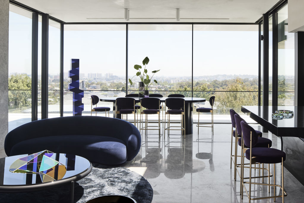 The top level offers 180-degree views of the city. Sculpture in background by Greg Penn. Sculptures on coffee table by Anna Dudek. Photo: SHARYN CAIRNS PHOTOGRAPHY