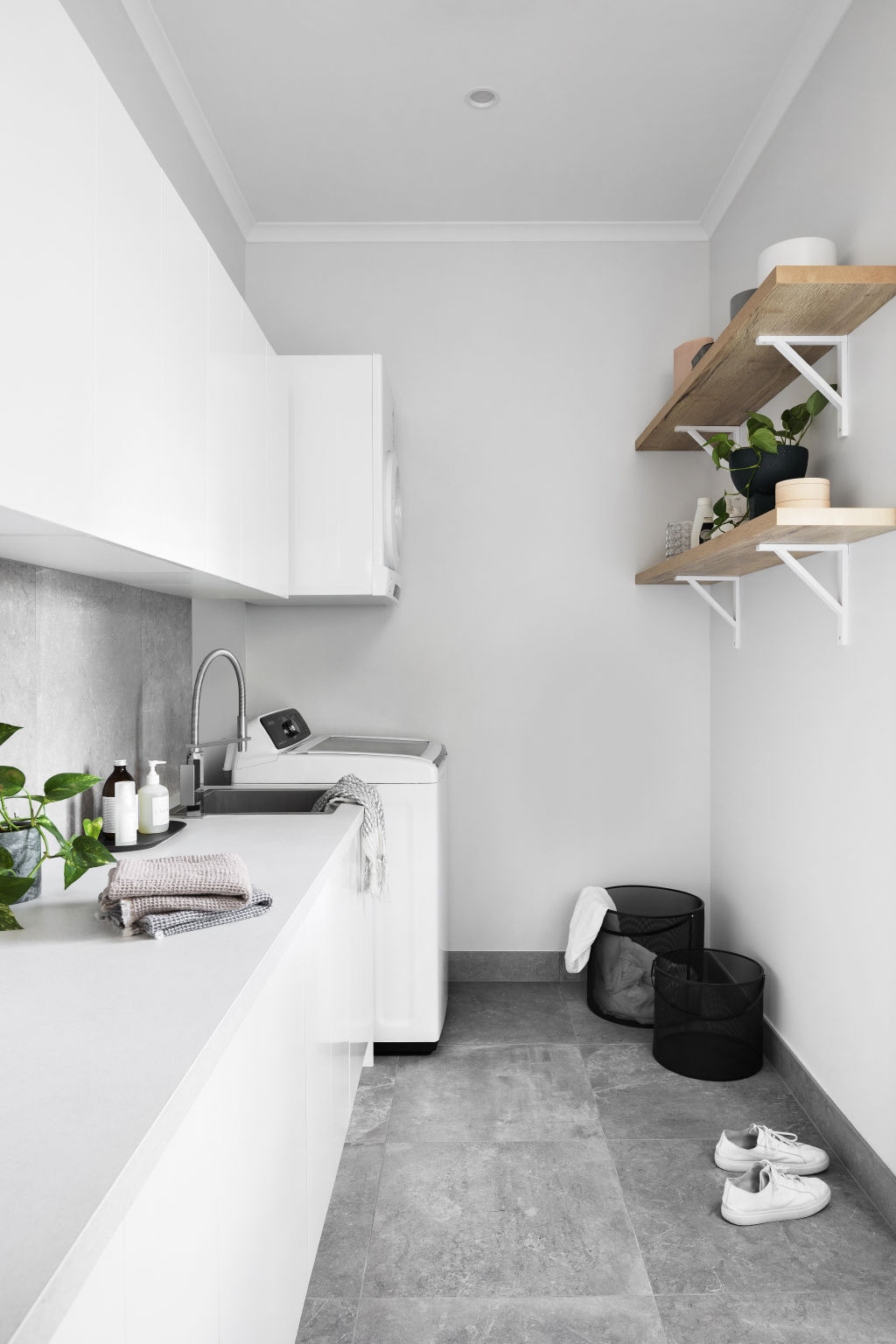 According to Cooper, you can also contain costs by focusing on the fitout rather than splashing out on new appliances. Photo: Kaboodle Kitchen