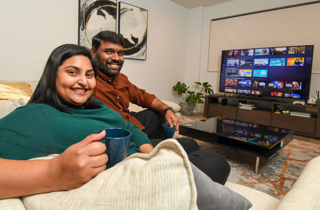 First-home buyers Harika Garapati and Sid Potluri in their newly purchased apartment in Schofield, Sydney. Photo: Peter Rae