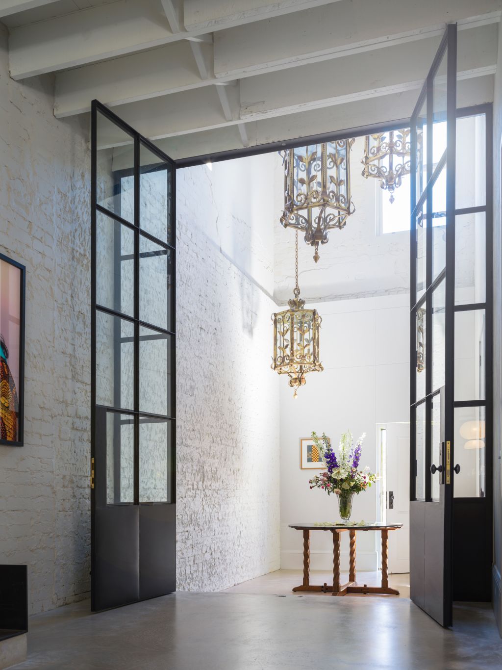 Soaring ceiling heights make for an epic entryway. Photo: Justin Alexander
