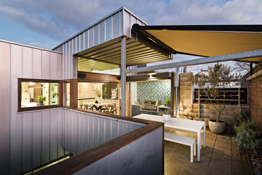 The outdoor entertaining area on the second floor. Photo: Jellis Craig