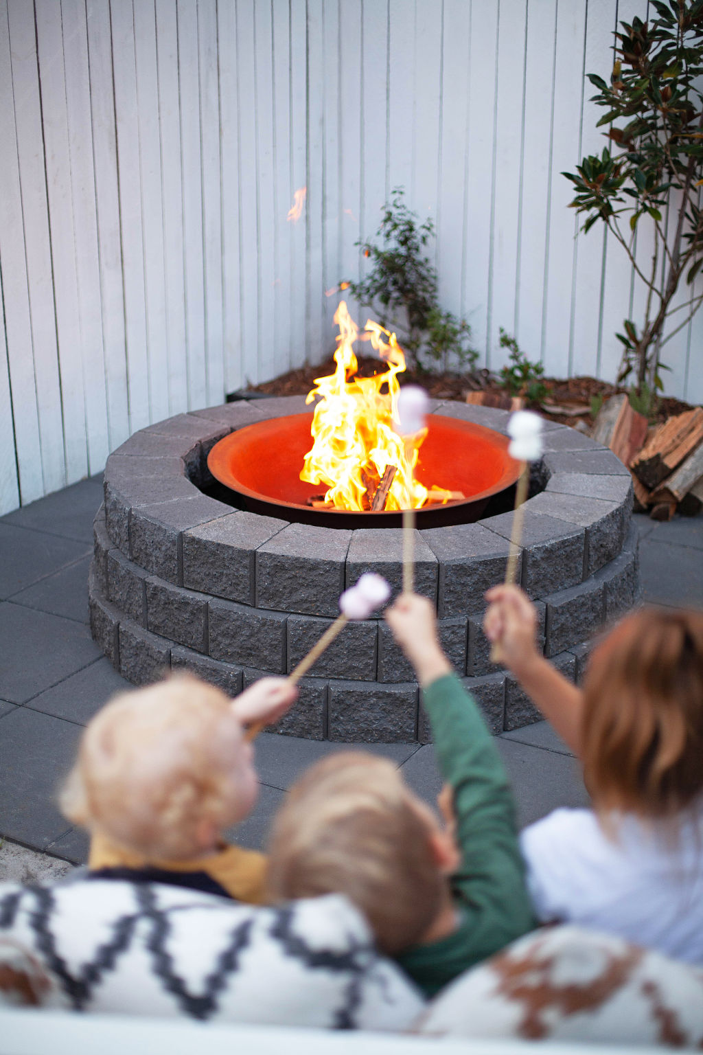 Creating your own backyard fireplace doesn’t have to be expensive. Photo: Adbri Masonry.