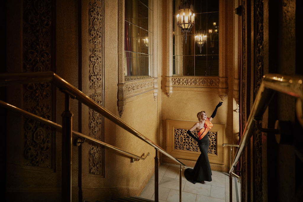 Rhonda Burchmore at the Regent Theatre. Stylist: Suzy Eskander Dress: Zian Couture Shoes: Lana Wilkinson Jewellery: Jeanette Maree Make-up: Beth Haywood Photo: Kristoffer Paulsen