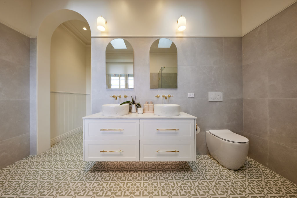 Arched mirrors and door frames are an easy way to incorporate curves into your space. Photo: Supplied