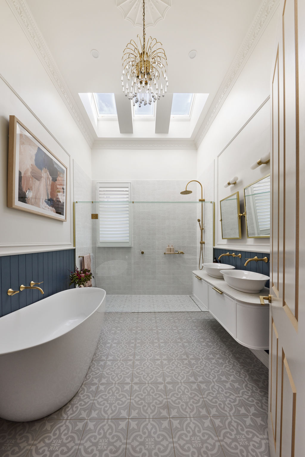 Tom and Sarah-Jane's bathroom chandelier is a show-stopper. Photo: Nine