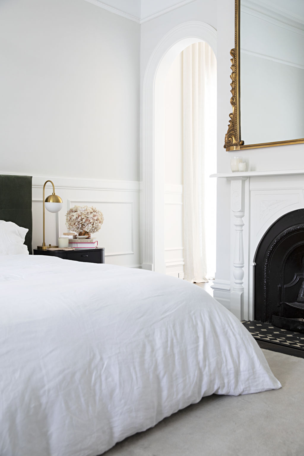 The main bedroom comes with high ceilings, plenty of light and a feature fireplace. Photo: Natalie Jeffcott