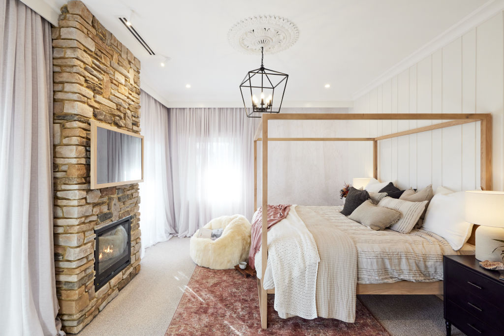 Execution is everything with Rachel and Ryan's stacked fireplace. Photo: Nine