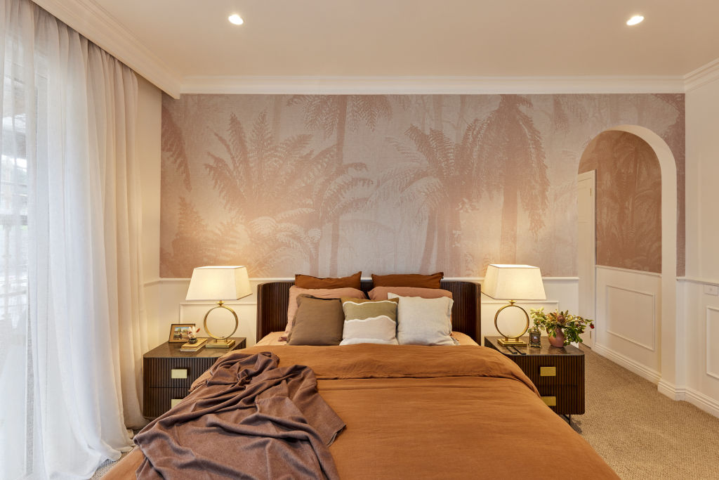 Dylan and Jenny’s master bedroom feature wall lifted the room's glamour. Photo: Nine