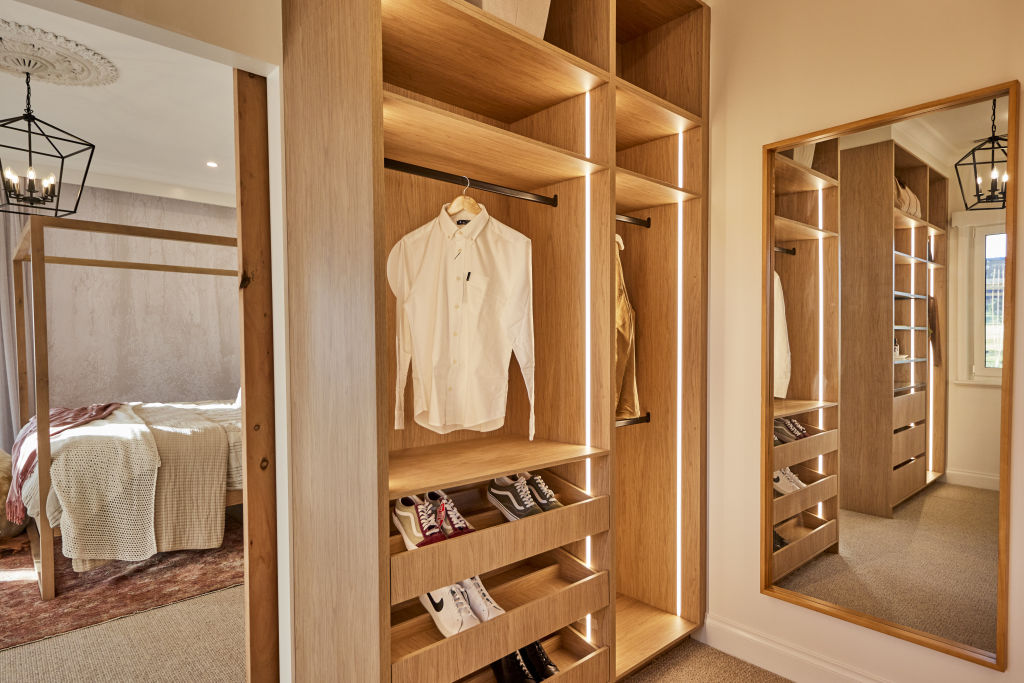 Rachel and Ryan's walk-in-robe has open shelving - a big tick for that luxe feel. Photo: Nine