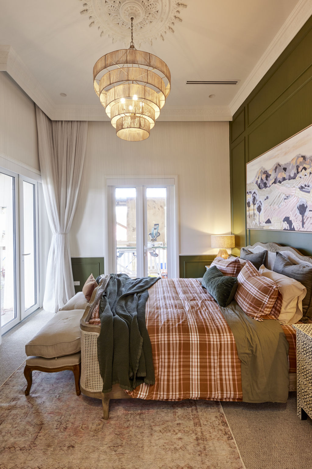 Wainscotting and paint elevates these walls from plain to country comfort. Photo: Nine