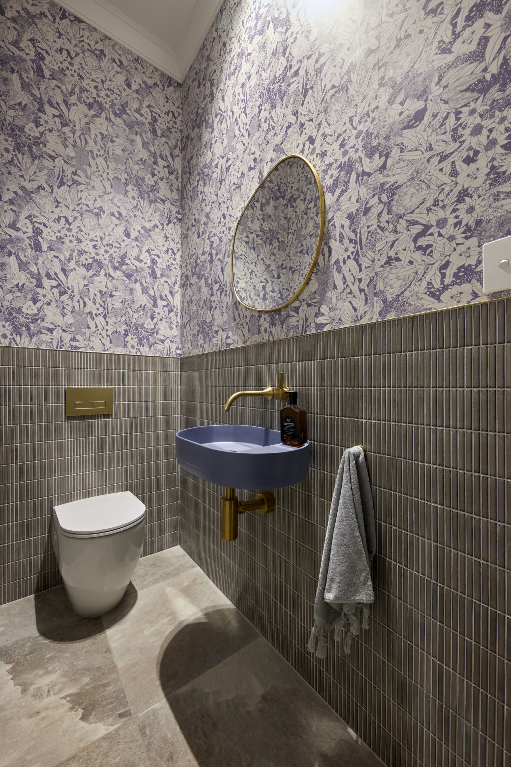 Combine wallpaper with wall panelling, tiles or contrasting coloured paint Photo: Nine