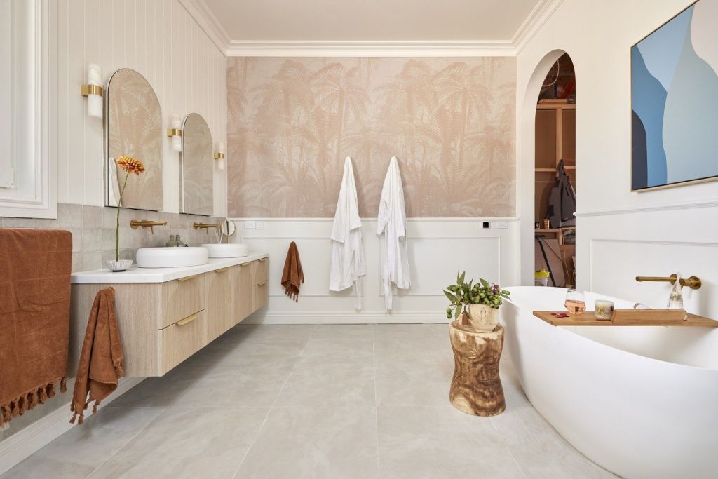 Dylan and Jenny's subtle pink fern print wallpaper adds colour and flair. Photo: TCC Real Estate