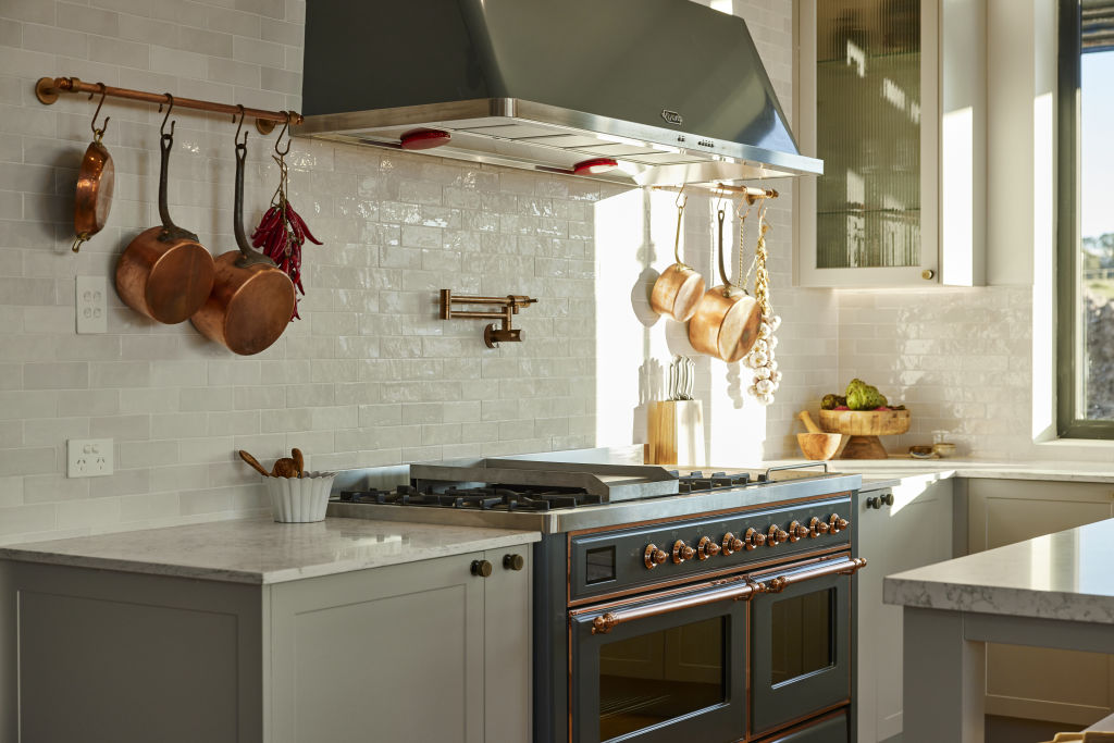 Having your cookware on display is a trend that makes perfect sense in a country kitchen. Photo: Nine