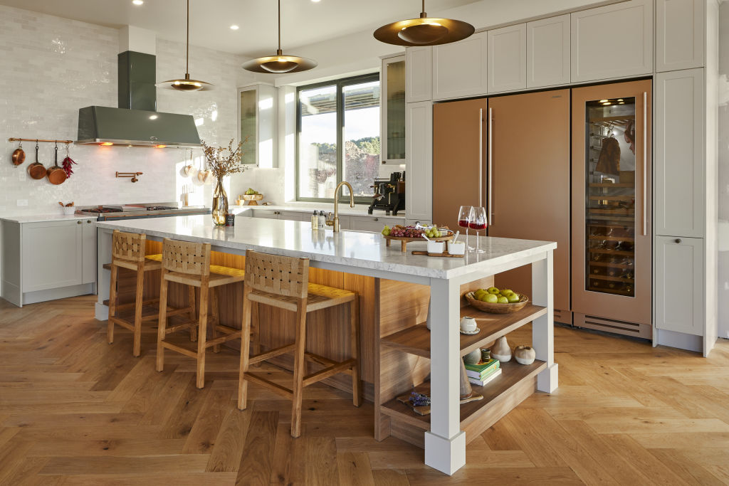 Brass, copper, rose gold and steel? Somehow it all works in Tom and Sarah-Jane's kitchen. Photo: Nine