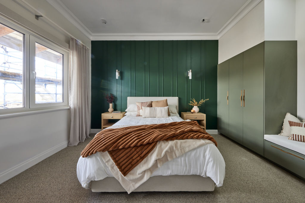 Darren doesn't love the colour in the guest bedroom. Photo: Nine