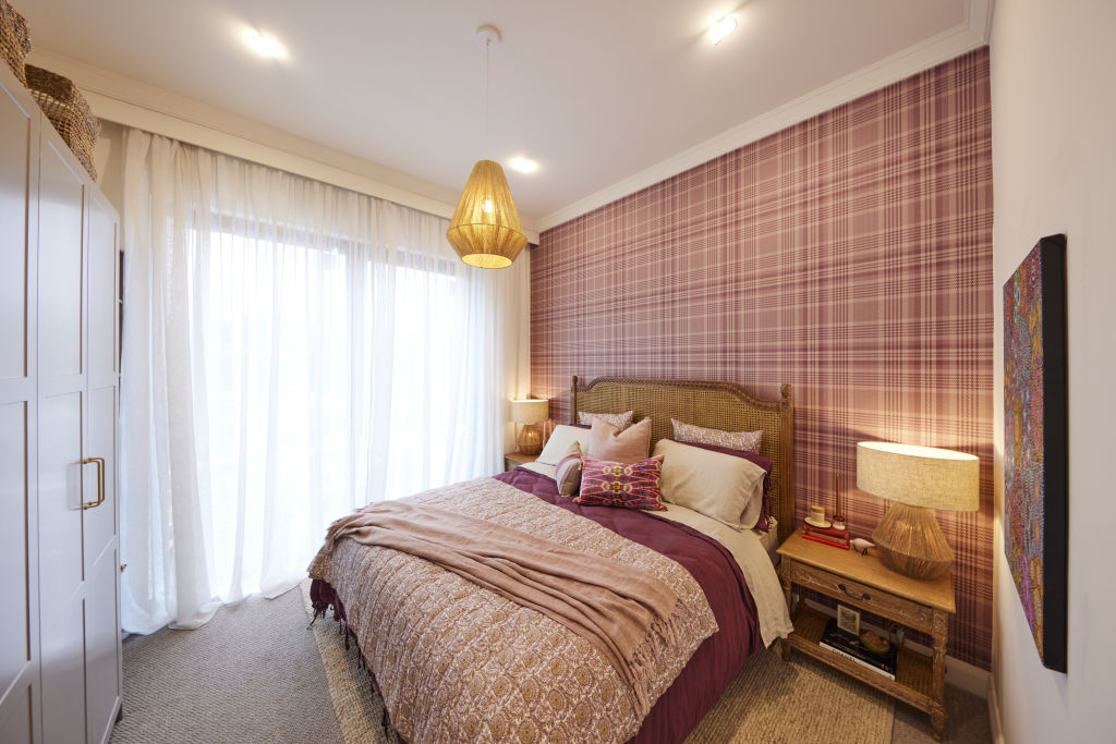 The judges love the pink tartan wallpaper in Tom and Sarah-Jane's guest bedroom. Photo: Nine