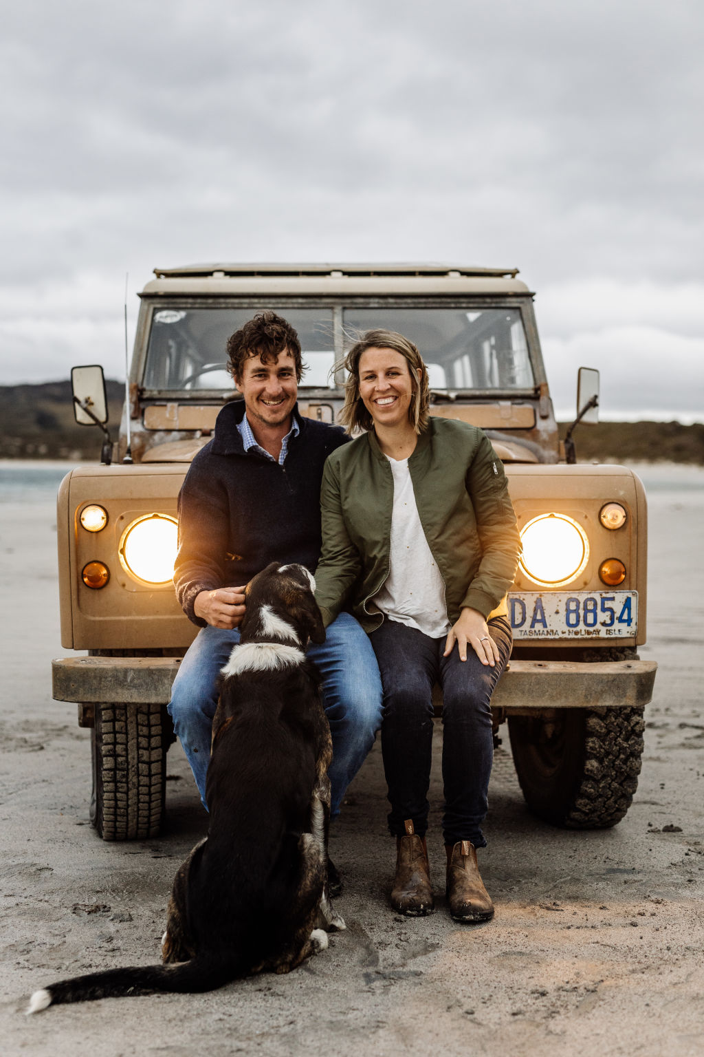 The isolation, the quiet roads, crystal clear beaches and small community has never stopped charming the couple, who are now parents to three young children. Photo: Supplied