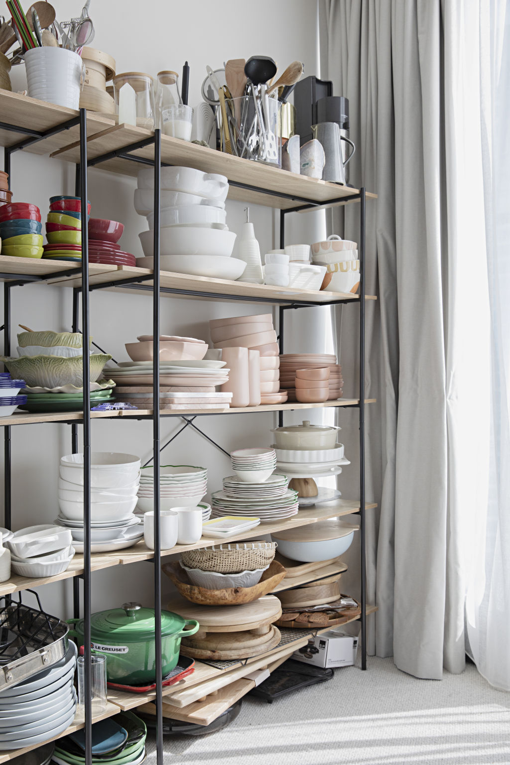 A spare bedroom was repurposed into 'the everything room', a storage space for Ong to keep his plethora of crockery. Photo: Natalie Jeffcott