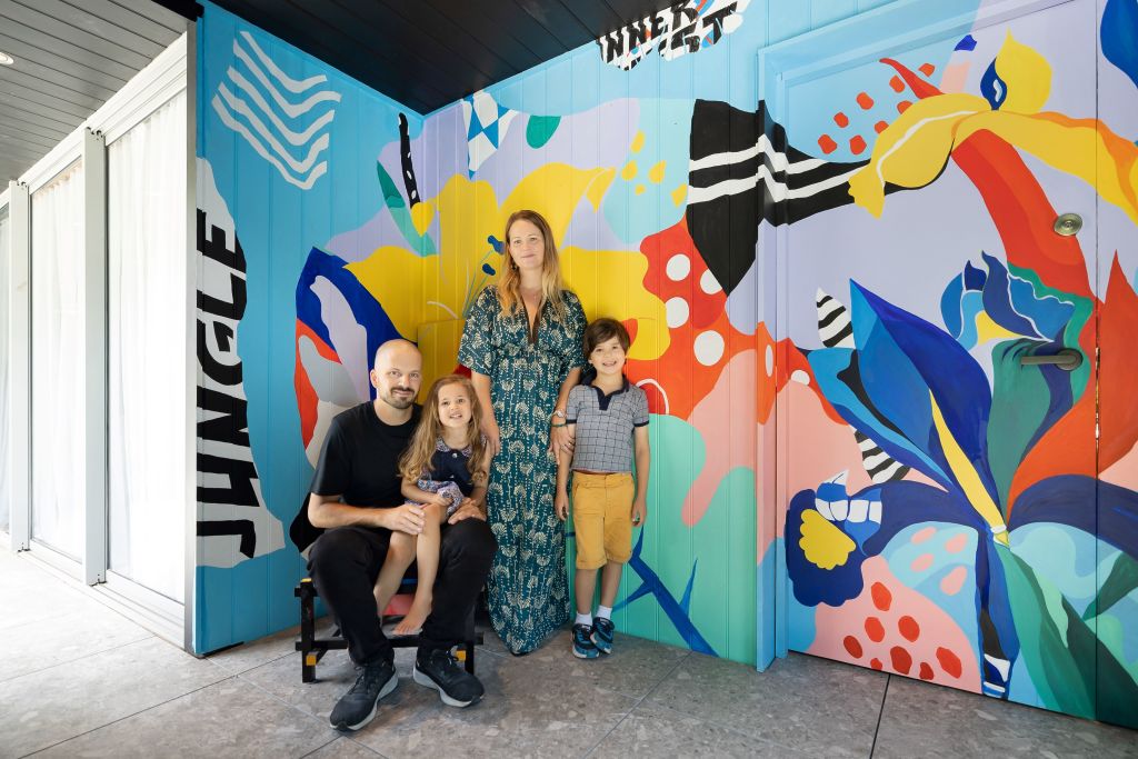 Architect Julian Furzer and artist Aurelie Perthuis Furzer and their two children Ellenora, 4, and Artur, 6, at their Petersham home. Photo: Guil Hornos