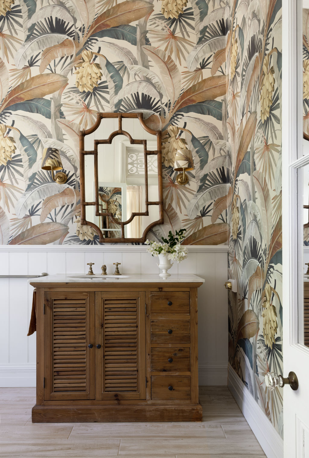 Nothing boring here: the couple chose bold Catherine Martin wallpapers for the bathroom. Photo: The Design Villa