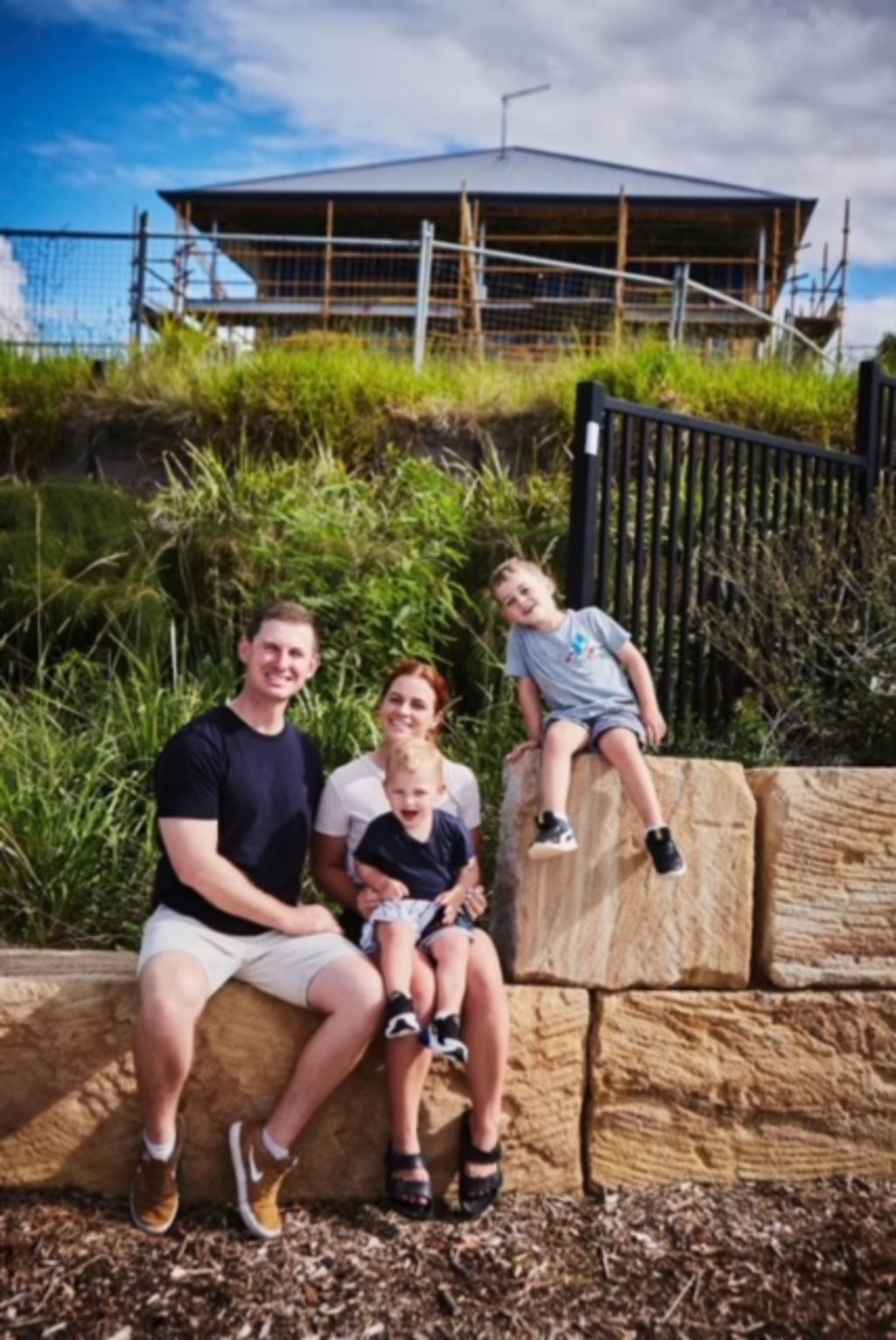 Matt and Katie Collins, pictured with their sons Callan and Marcus, have traded life in the inner city for the outer suburbs. Photo: Supplied