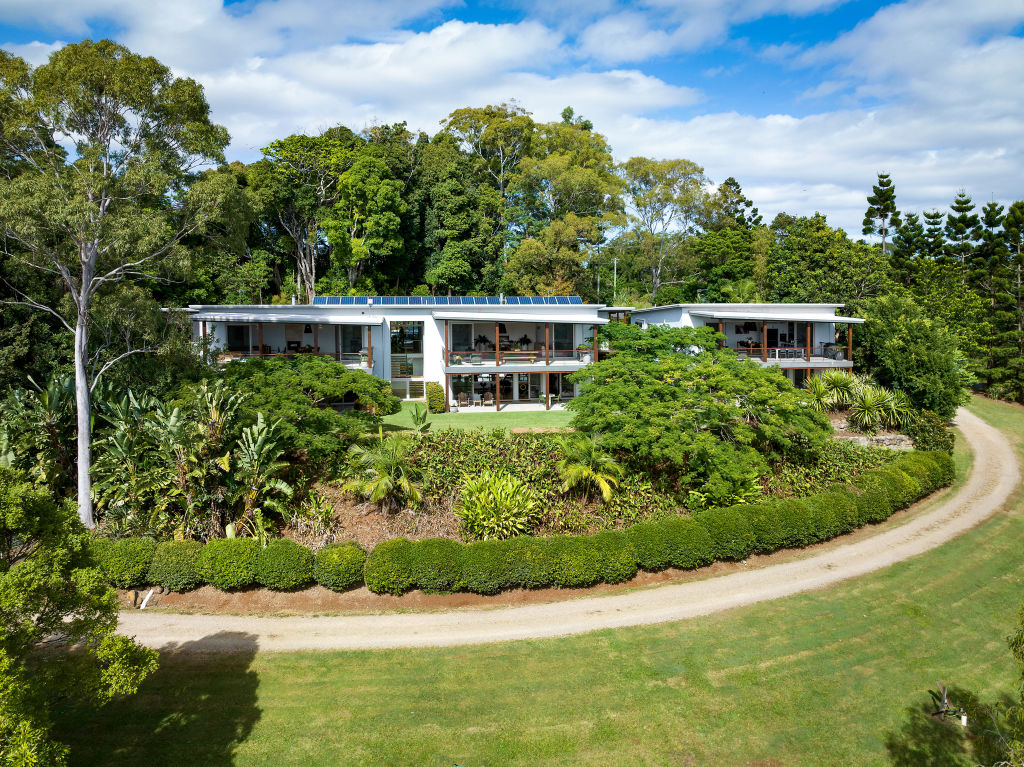 The main house and guest house sit side by side on the property with exceptional views.  Photo: Supplied