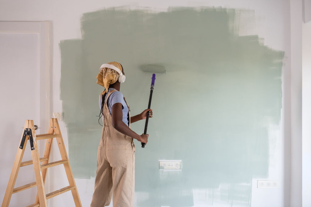 Painting is an easy way to make a big difference when renovating. Photo: Stocksy