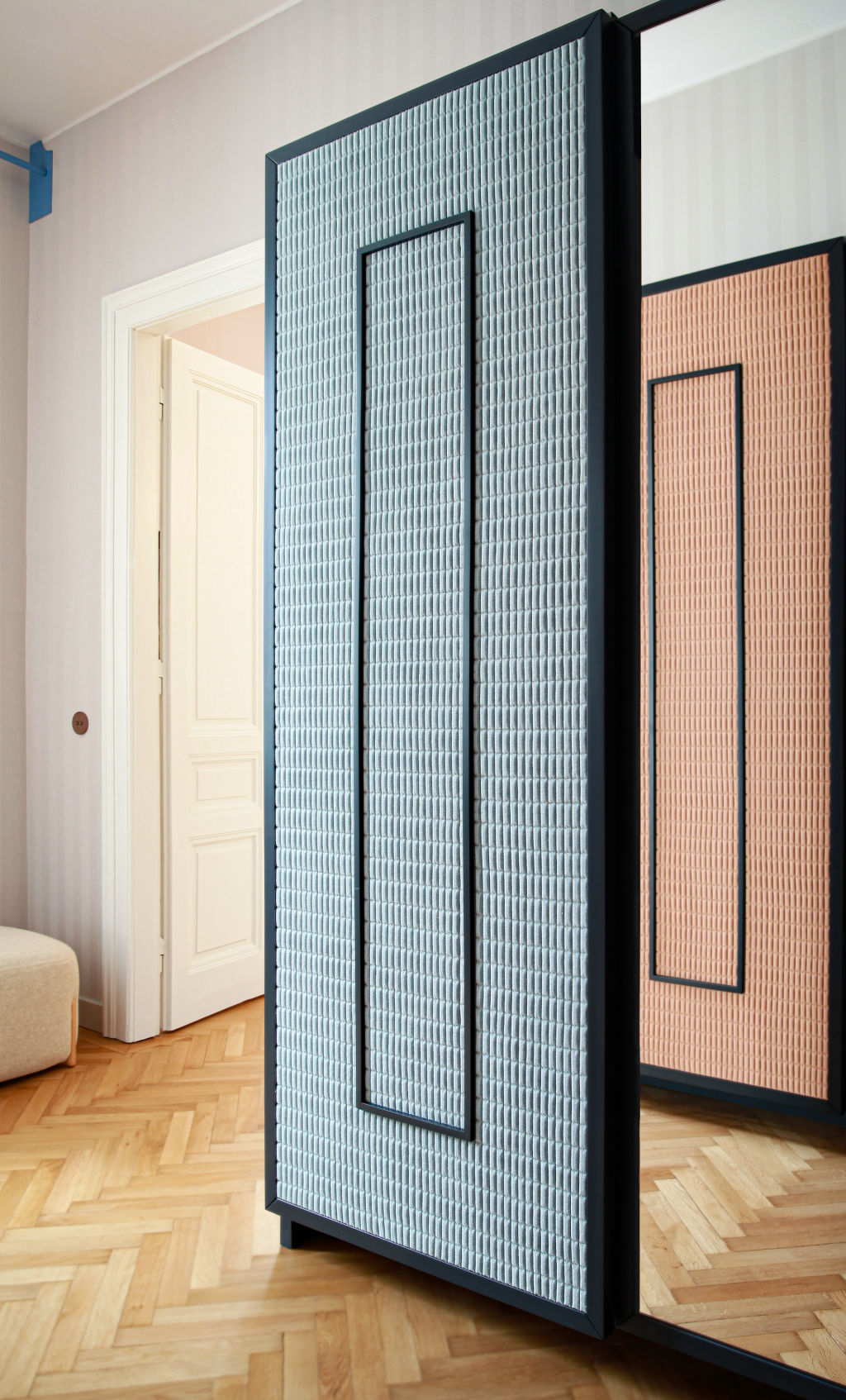 Fabric panel screens divide the living spaces. Photo: Carola Ripamonti