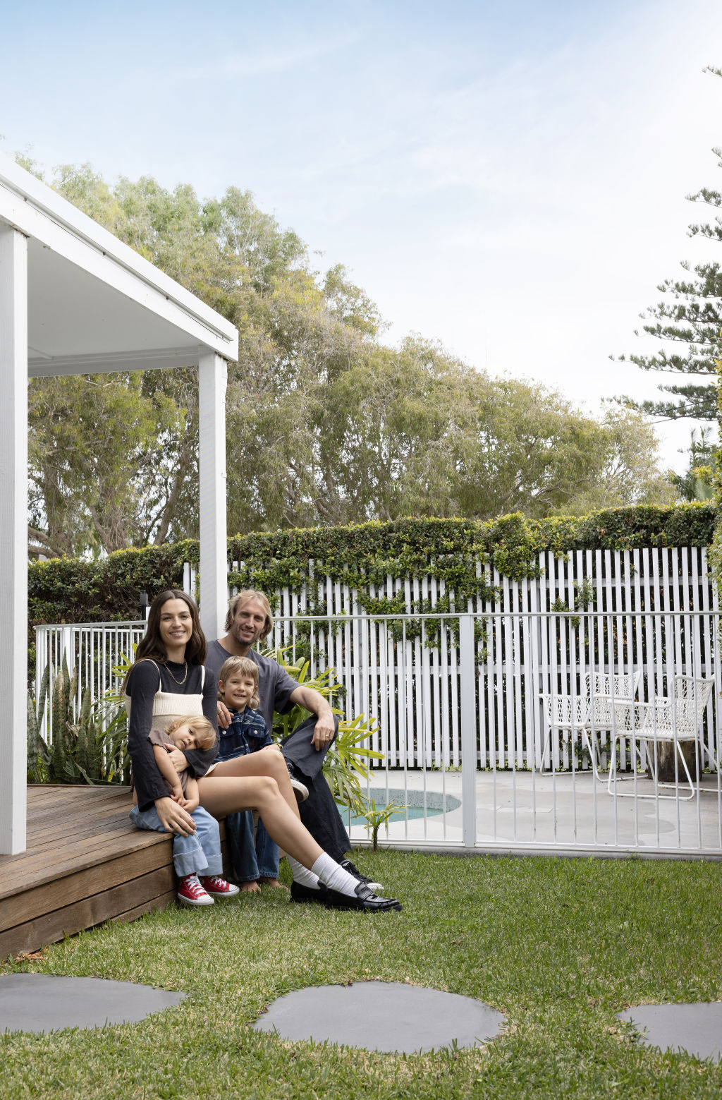 Kita Alexander and Owen Wright with their children, Vali and Rumi, at their property close to Belongil Beach. Photo: Louise Roche - The Design Villa