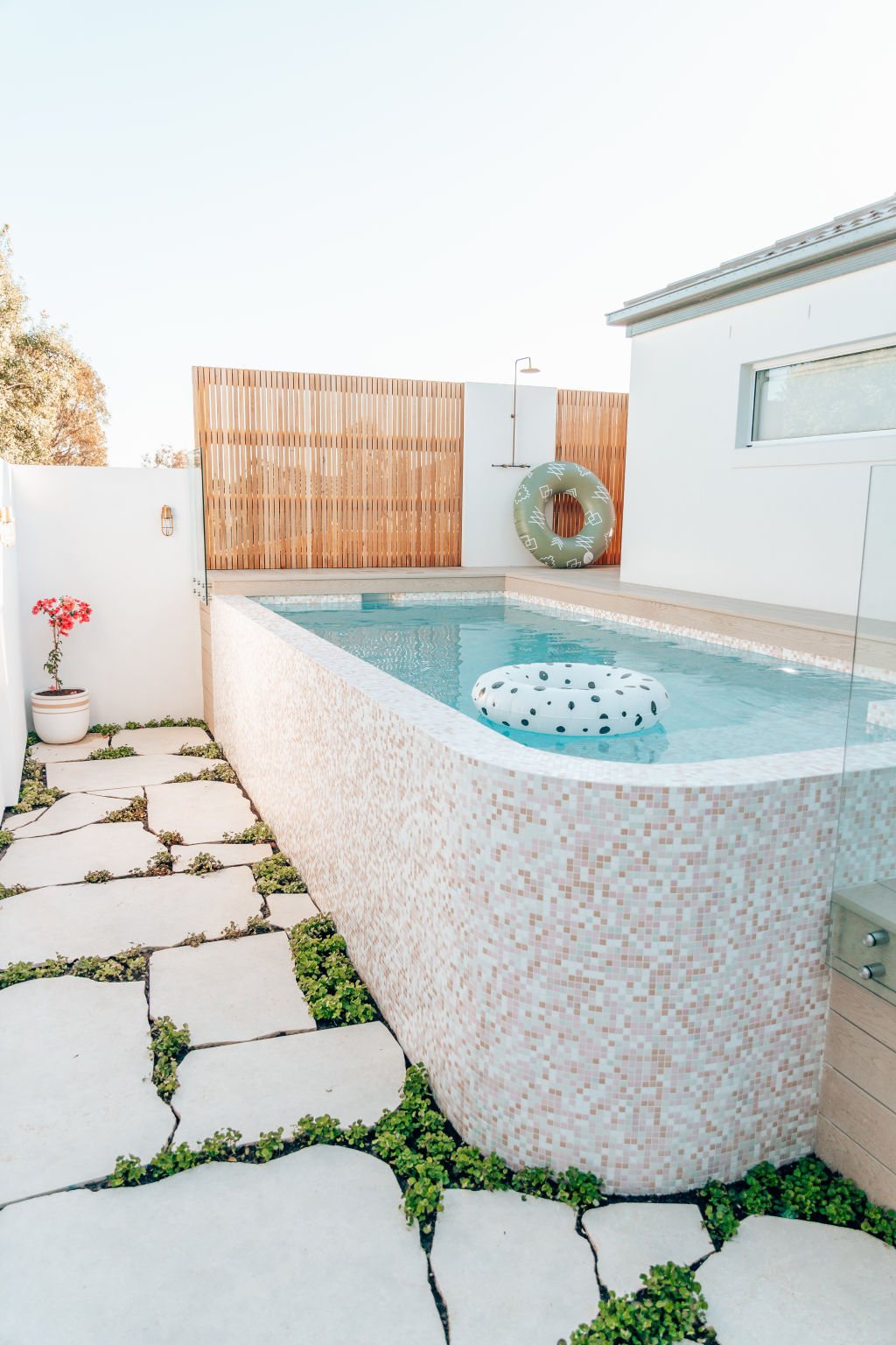 Krystal Dahaby wrapped her above-ground pool in tiny pink mosaic tiles. Photo: Krystal Dahaby