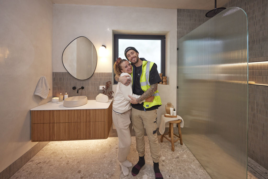 Kristy and Brett are happy about the bathroom they delivered, but beware, a house can have too many showers.