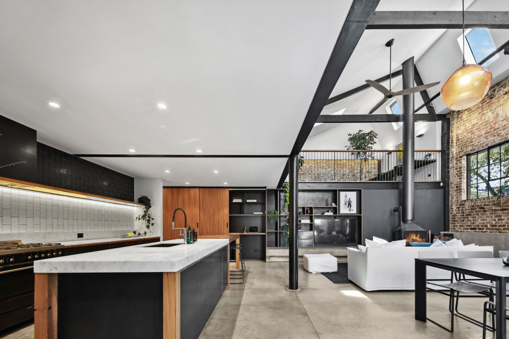 Heated polished concrete floors run through the living area. Photo: Supplied