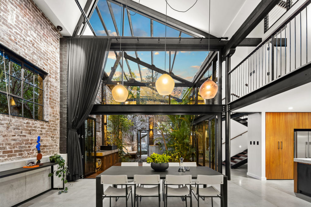 The home features soaring seven-metre-high ceilings. Photo: Supplied