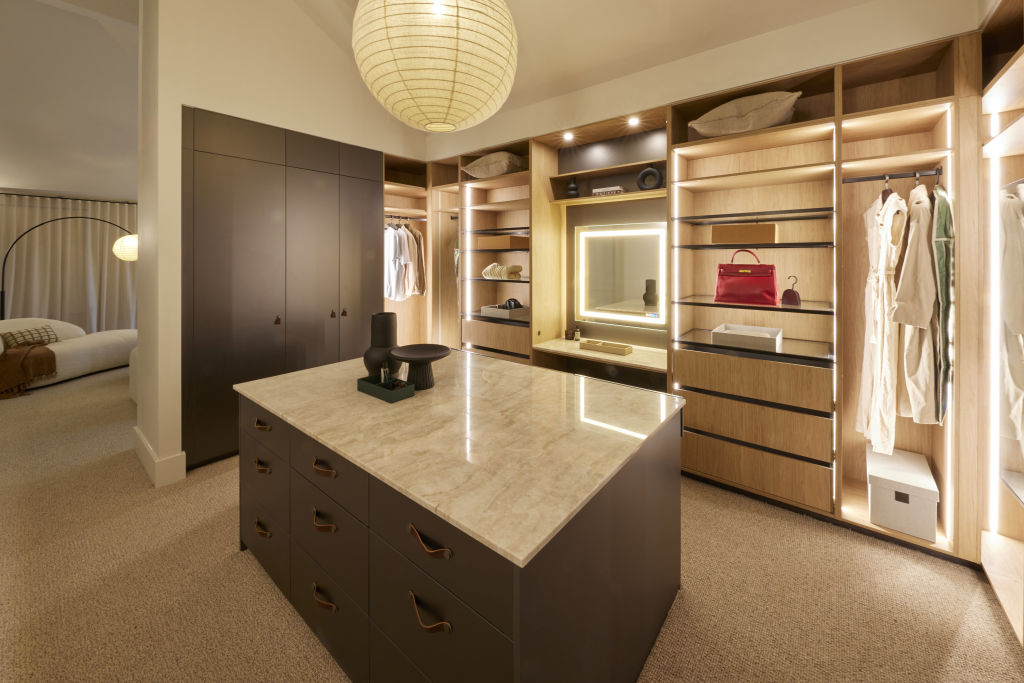 The Block 2023: Steph and Gian's main bedroom walk-in robe combines practical storage with luxury elements. Photo: Nine