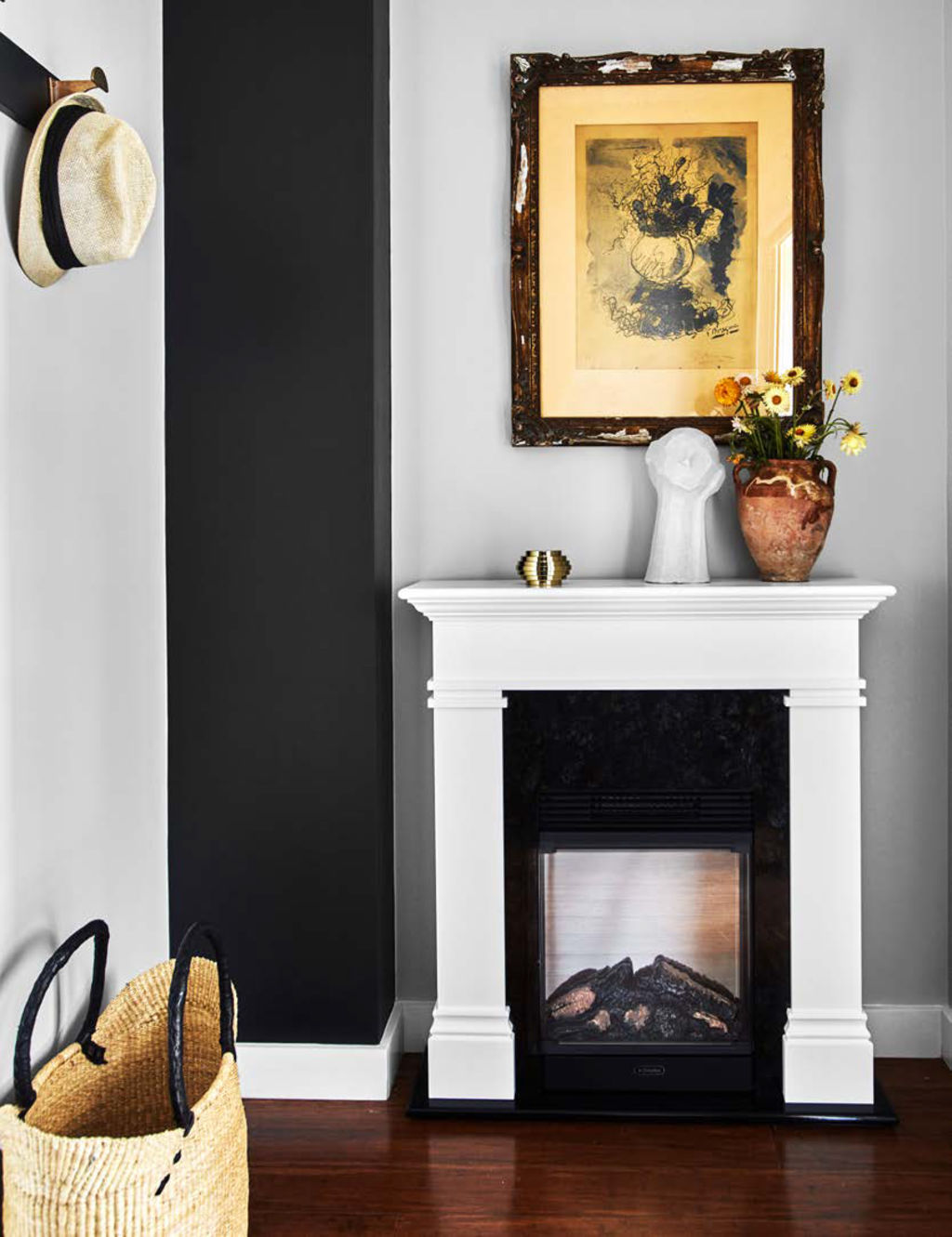 You can have that cosy fire feel, even in a rental, designer Lynne Bradley says. Photo: Will Horner