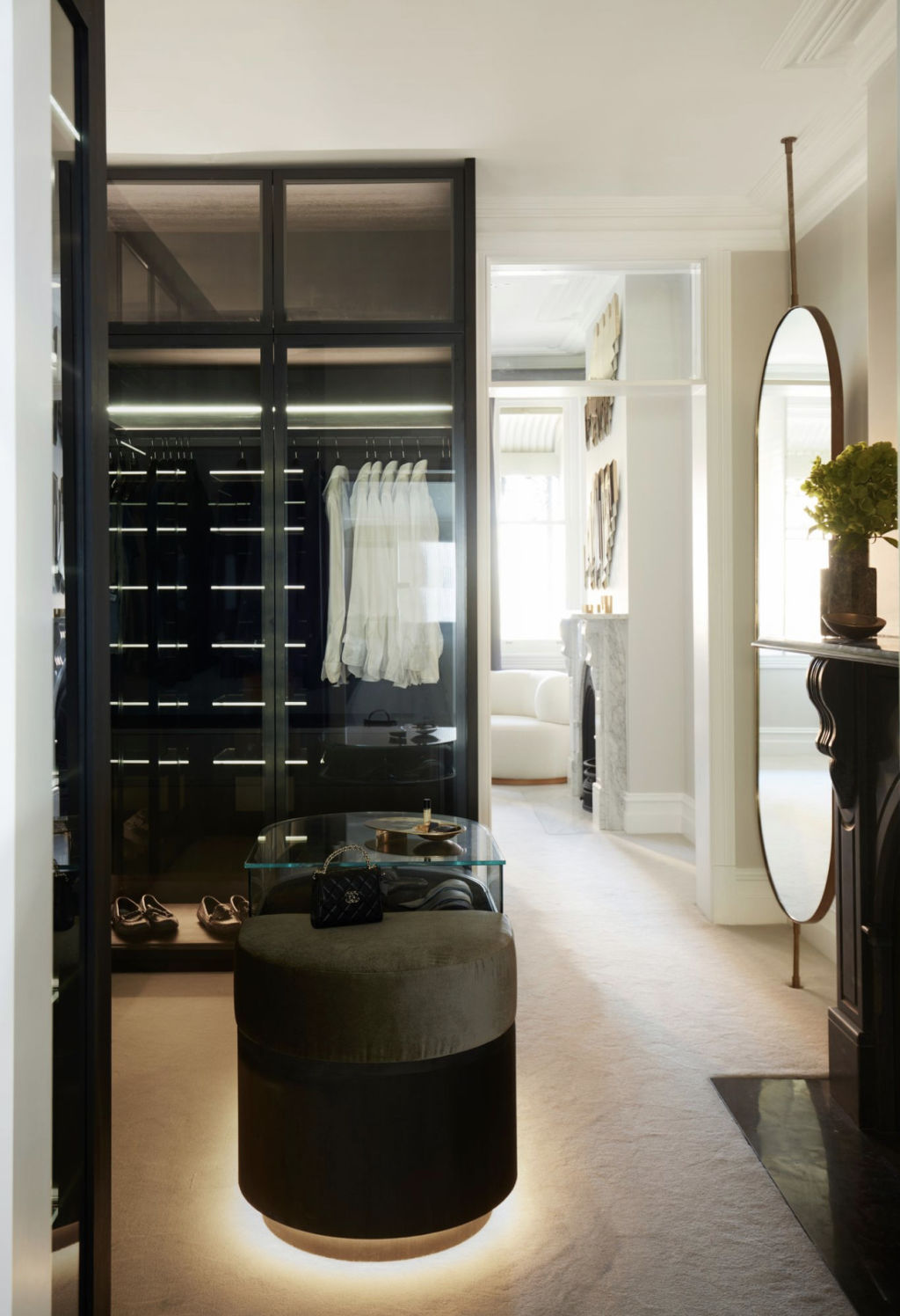 Designer Nina Maya used steel and timber to give the wardrobe in this Potts Point home a dark and moody feel. Photo: Prue Ruscoe