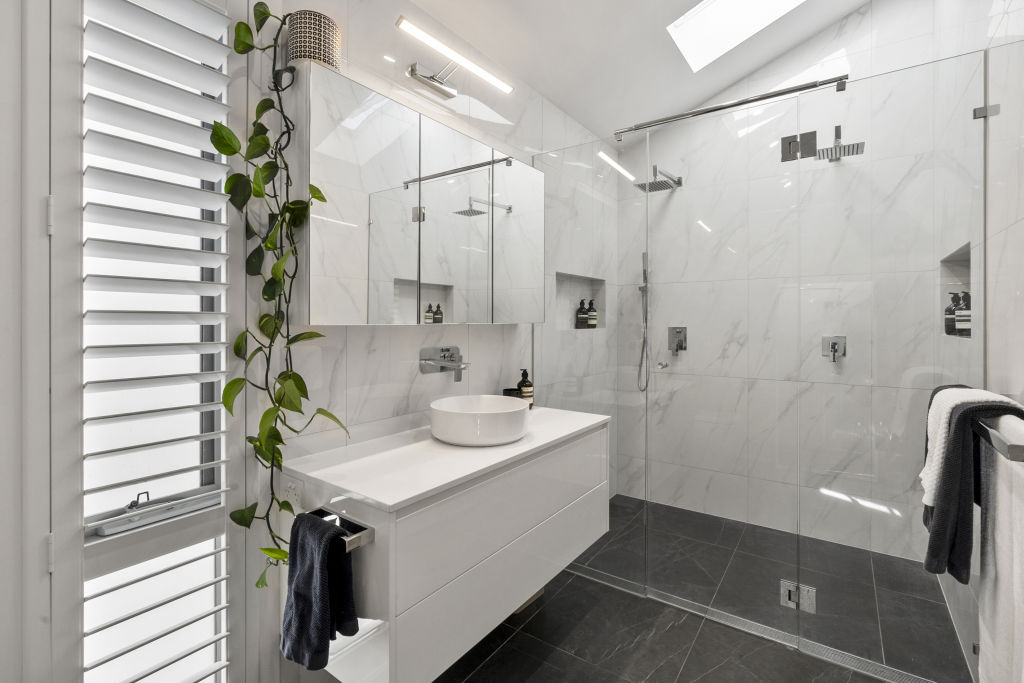 Walk-in showers are popular for bathroom renovations.