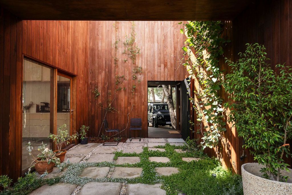The couple made use of salvaged materials where they could, opting for jarrah cladding. Photo: ZSA ZSA Property